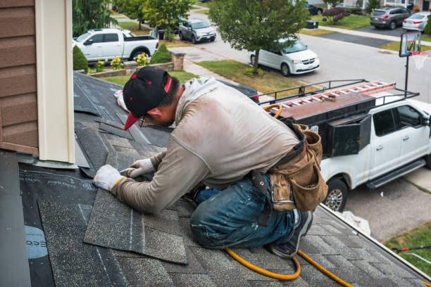 Professional Emergency Roof Repair technician working in Minot AFB, ND